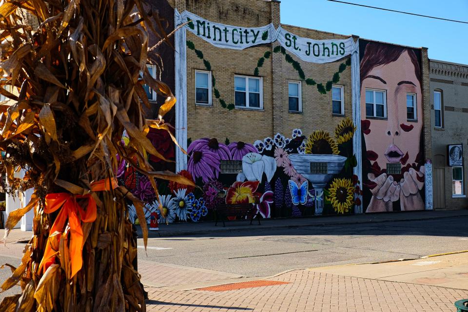 Downtown St. Johns is getting into the Halloween spirit by businesses decorating storefronts with colorful, fall themed presentations. Sunday, Oct. 17, 2021.