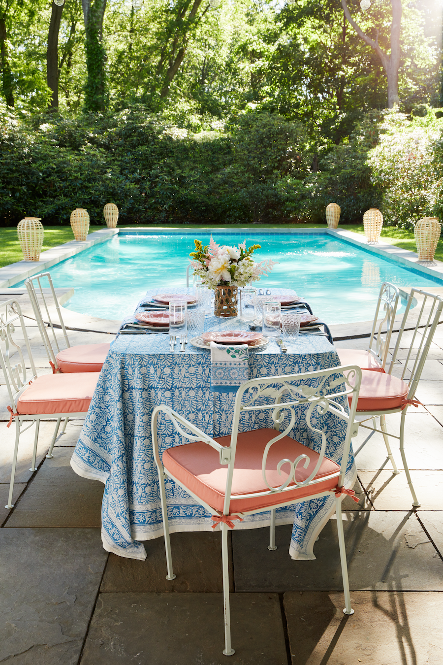 <p>This lush patio belongs to Jenna Bush Hager, who gave us on a <a href="https://www.veranda.com/home-decorators/a29416525/jenna-bush-hager-home-tour/" rel="nofollow noopener" target="_blank" data-ylk="slk:tour of her Long Island home" class="link ">tour of her Long Island home</a> in our November/December 2019 issue. Vintage iron garden furniture, layered table linens from <a href="https://go.redirectingat.com?id=74968X1596630&url=https%3A%2F%2Famandalindroth.com%2F&sref=https%3A%2F%2Fwww.veranda.com%2Foutdoor-garden%2Fg27214784%2Fpatio-ideas-backyard%2F" rel="nofollow noopener" target="_blank" data-ylk="slk:Amanda Lindroth" class="link ">Amanda Lindroth</a>, and <a href="https://www.juliska.com/" rel="nofollow noopener" target="_blank" data-ylk="slk:Juliska glassware" class="link ">Juliska glassware</a> make this an ideal setup for all your garden parties and summer luncheons. </p>