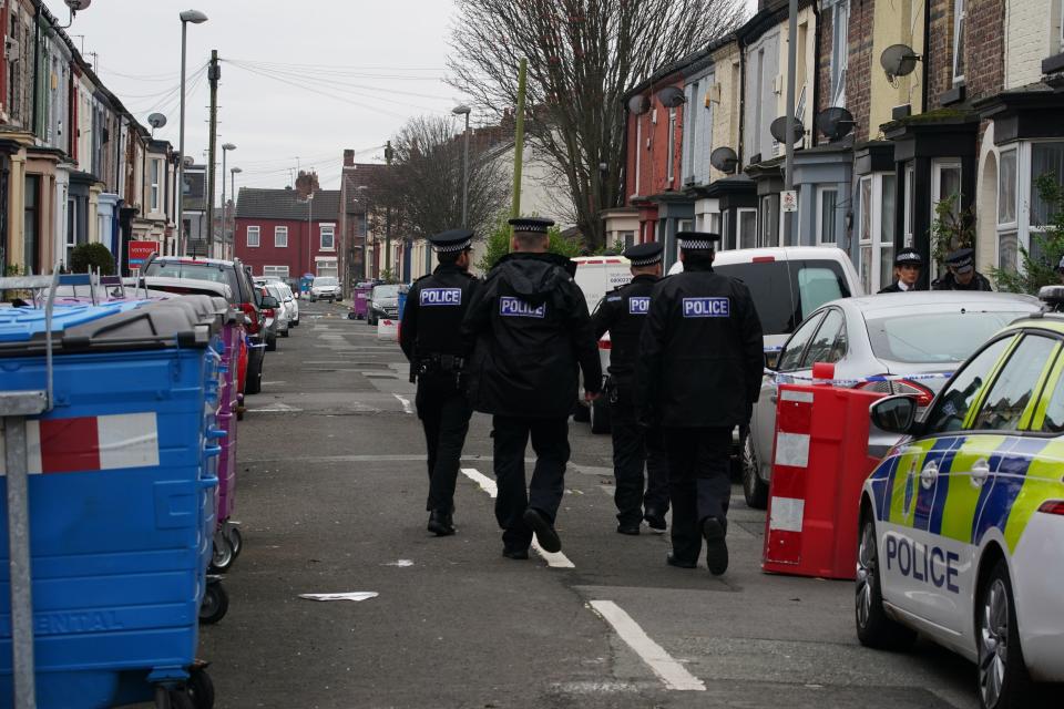 Police activity in Sutcliffe Street in the Kensington area of Liverpool (PA)