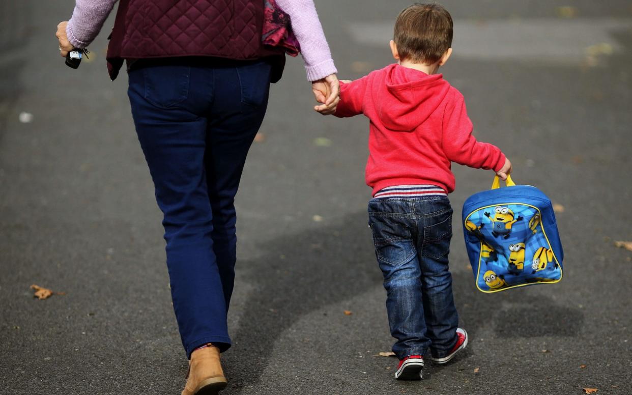 The price of sending a young child to nursery part-time is now £122 a week, according to a new report which says the cost of childcare is soaring - PA