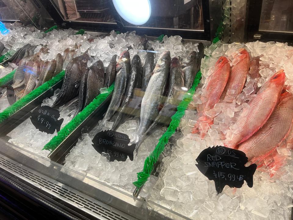 A row of fresh fish on ice