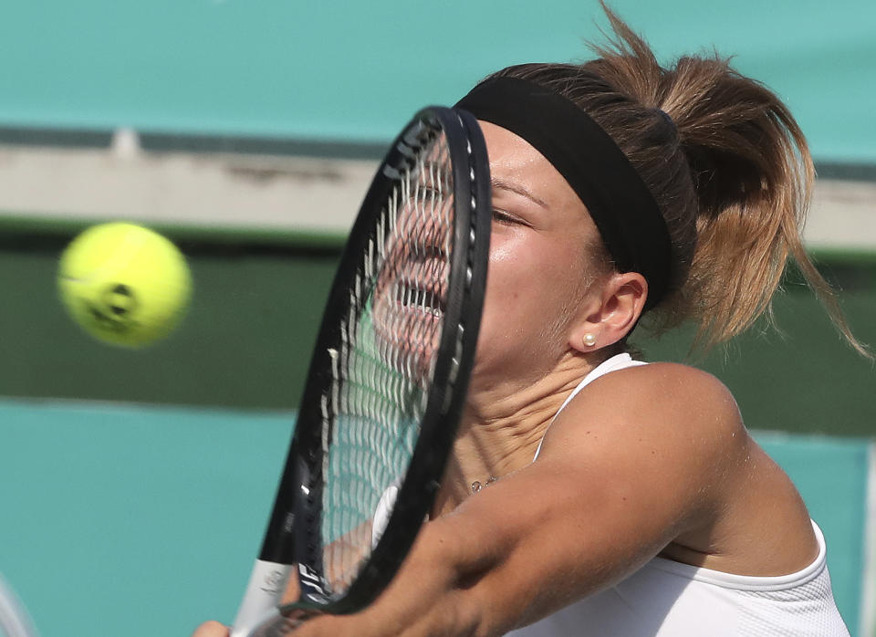 Karolina Muchova of the Czech Republic returns a shot to Timea Babos of Hungary during their second round match of the Korea Open tennis championships in Seoul, South Korea, Thursday, Sept. 19, 2019. (AP Photo/Ahn Young-joon)