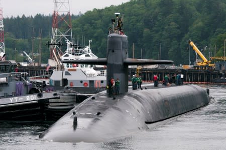 Following a routine strategic deterrent patrol, the Ohio-class ballistic-missile submarine USS Alabama returns to Naval Base Kitsap-Bangor in Bangor