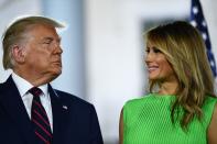 US First Lady Melania Trump smiles to US President Donald Trump atthe conclusion of the final day of the Republican National Convention from the South Lawn of the White House on August 27, 2020 in Washington, DC. (Photo by Brendan Smialowski / AFP) (Photo by BRENDAN SMIALOWSKI/AFP via Getty Images)