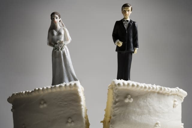 Wedding cake visual metaphor with figurine cake toppers