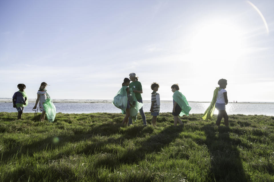 Group activities like cleaning up beaches are rewarding and have a great impact. (Getty Images)