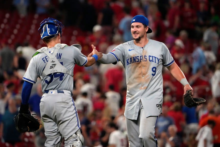 Kansas City Royals’ <a class="link " href="https://sports.yahoo.com/mlb/players/12449/" data-i13n="sec:content-canvas;subsec:anchor_text;elm:context_link" data-ylk="slk:Vinnie Pasquantino;sec:content-canvas;subsec:anchor_text;elm:context_link;itc:0">Vinnie Pasquantino</a> (9) and Freddy Fermin celebrate an 8-5 victory over the St. Louis Cardinals in the second game of a baseball doubleheader Wednesday, July 10, 2024, in St. Louis. (AP Photo/Jeff Roberson)