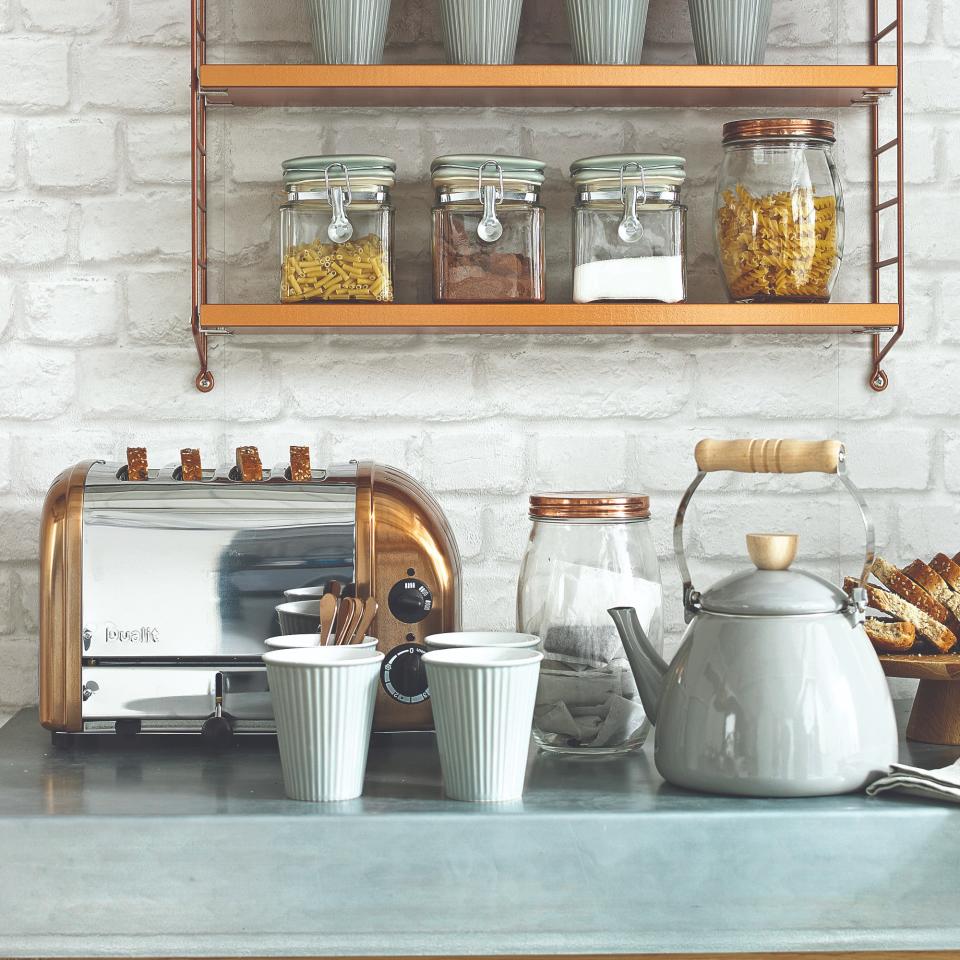 Kitchen worktop with a toaster and tea essentials