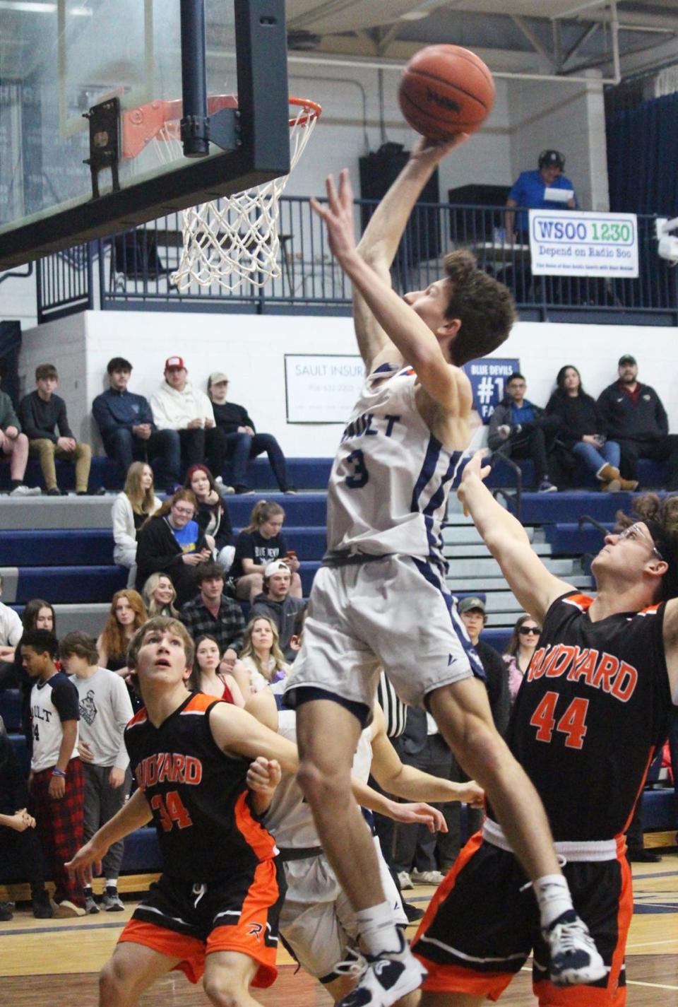 Sault guard Carter Oshelski drives to the basket during the first quarter of Wednesday night's Straits Area Conference matchup against the Rudyard Bulldogs.