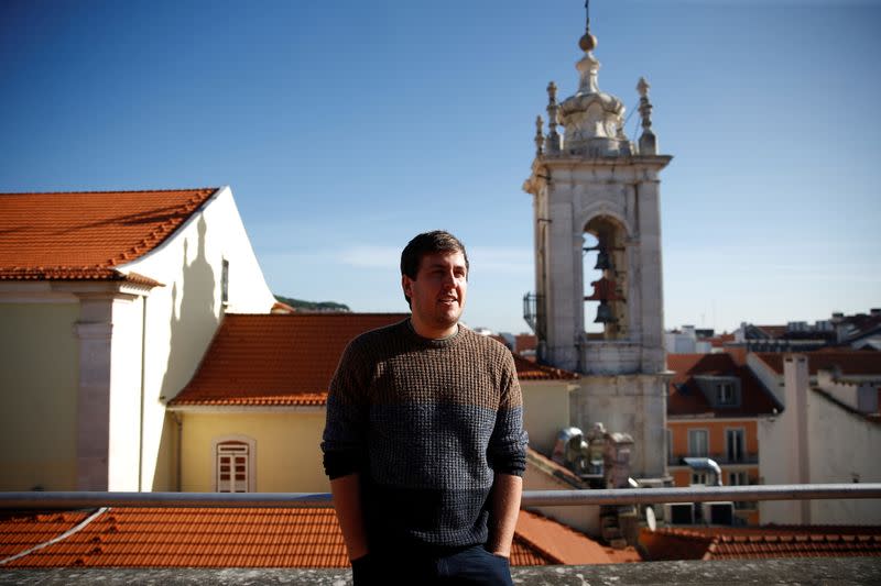 British citizen James Ellsmoor stands on his home terrace in Chiado, Lisbon