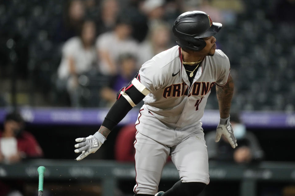 Arizona Diamondbacks' Ketel Marte grounds out against Colorado Rockies relief pitcher Yency Almonte to end the ninth inning of a baseball game Friday, May 21, 2021, in Denver. (AP Photo/David Zalubowski)