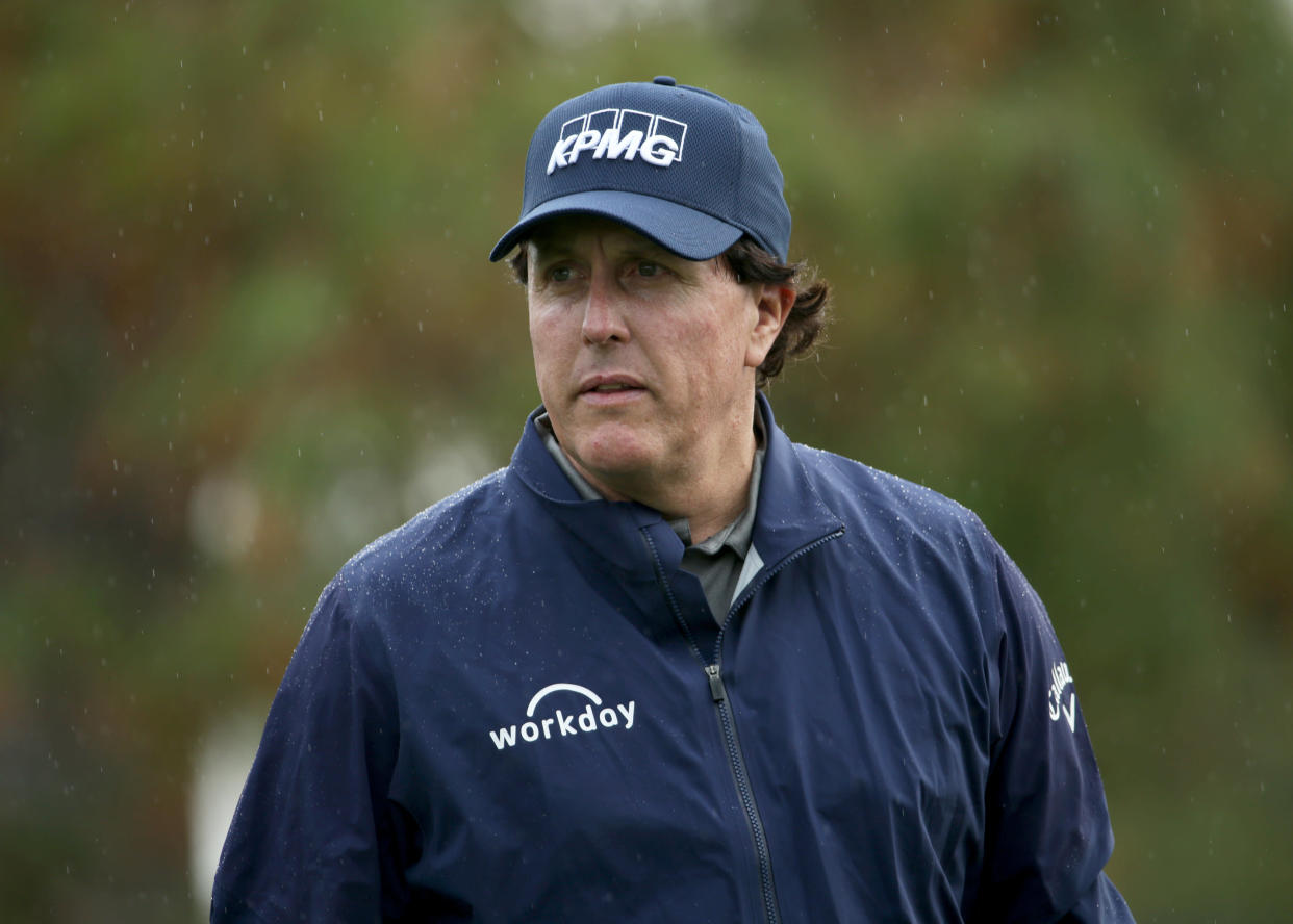 Phil Mickelson is "shocked" that the tutor he hired is facing racketeering and money laundering charges related to a college admissions scandal. (Getty)