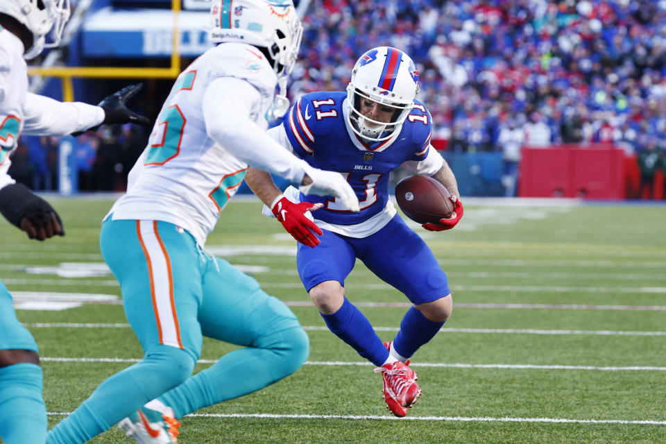 Buffalo Bills wide receiver Cole Beasley (11) drives towards the end zone on his touchdown during the second half of an NFL wild-card playoff football game against the Miami Dolphins, Sunday, Jan. 15, 2023, in Orchard Park, N.Y. (AP Photo/Jeffrey T. Barnes)