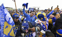 Fans react Thursday, April 25, 2025, in Hermosa Beach, Calif., as the Los Angeles Rams picked Florida State defensive end Jared Verse in the first round of the NFL football draft in Detroit. (Keith Birmingham/The Orange County Register via AP)