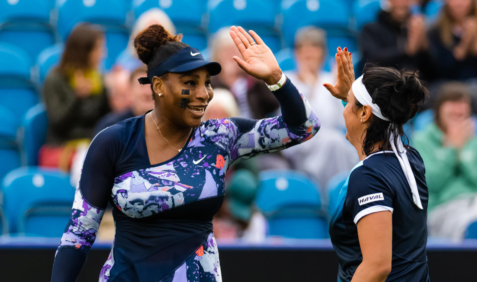 Serena Williams, pictured here celebrating with Ons Jabeur after their win over Marie Bouzkova and Sara Sorribes Tormo.