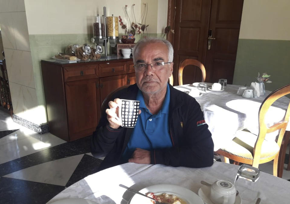 This photo provided by the Mohammed Saleh family, shows Mohammed Saleh having breakfast at a hotel on the Greek island of Syros, Tuesday, Sept. 24, 2019. Saleh, a Lebanese citizen was detained in Greece on suspicion of involvement in the 1985 TWA hijacking and set free after it turned out to be a case of mistaken identity. He is in good health and expected to fly back to Lebanon, Saleh and his wife said Tuesday. (Courtesy of the Mohammed Saleh family via AP)