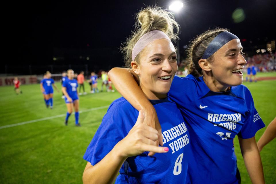 BYU’s Sierra Pennock (8) and Tara Warner (21) celebrate their win over Utah at Ute Field in Salt Lake City on Saturday, Sept. 9, 2023. | Spenser Heaps, Deseret News