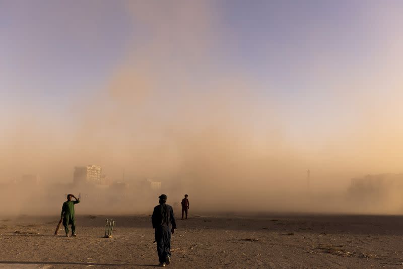 People play at the cricket park in Kabul