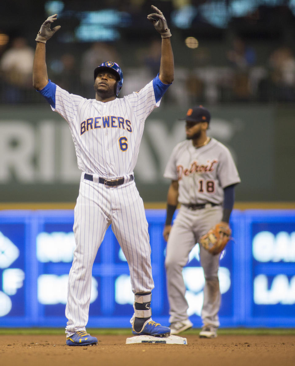 Milwaukee Brewers center fielder Lorenzo Cain celebrates his double hit against the Detroit Tigers during the seventh inning of an baseball game Sunday, Sept. 30, 2018, in Milwaukee. (AP Photo/Darren Hauck)