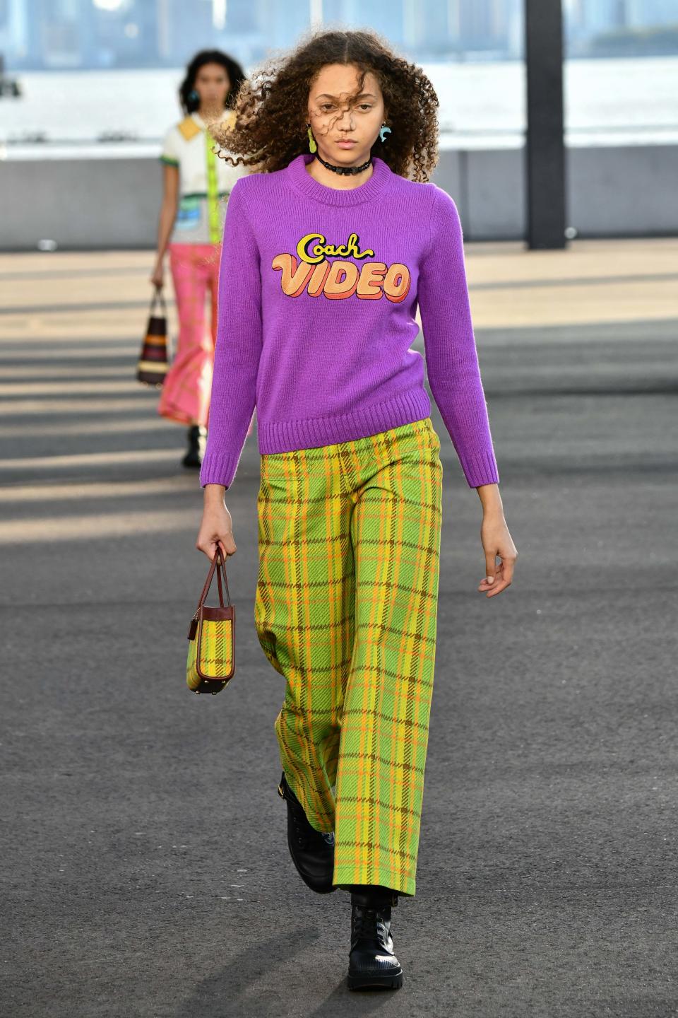 A look from Coach’s spring 2022 show in New York. - Credit: Rodin Banica/WWD