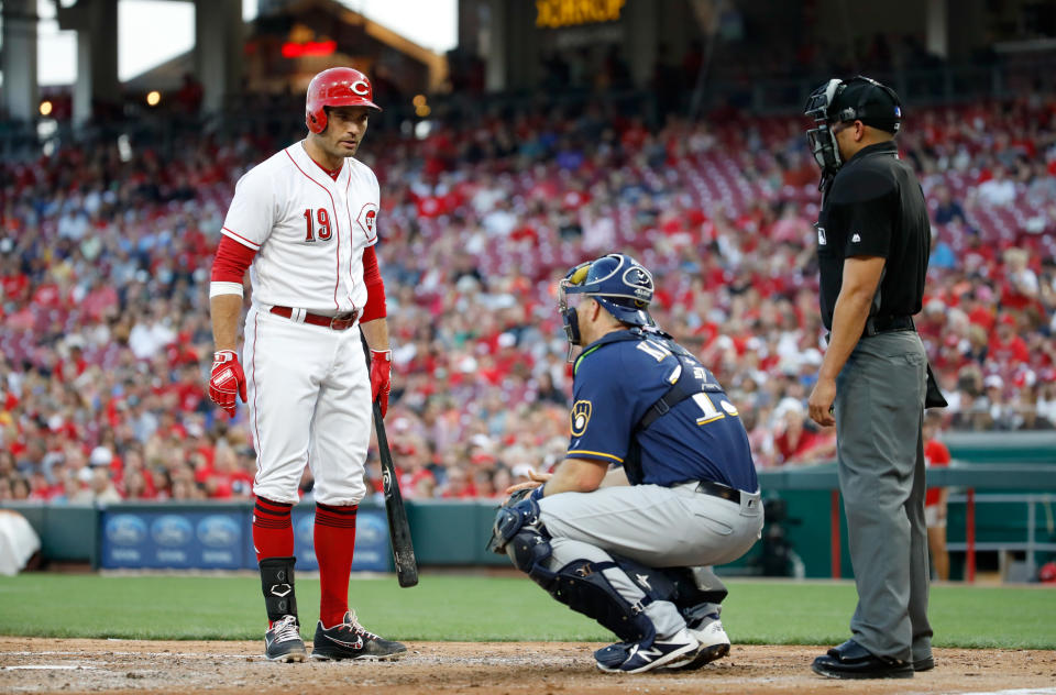 Joey Votto and Erik Kratz exchanged words Thursday. (Getty Images)