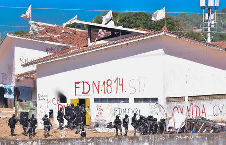 Riot police enter at the Alcacuz prison during an uprising in Natal, Rio Grande do Norte state, Brazil. REUTERS/Josemar Goncalves