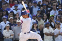 Chicago Cubs' Miguel Amaya watches his pinch-hit RBI single, in his first major league at bat, during the eighth inning of a baseball game against the Miami Marlins on Saturday, May 6, 2023, in Chicago. (AP Photo/Charles Rex Arbogast)