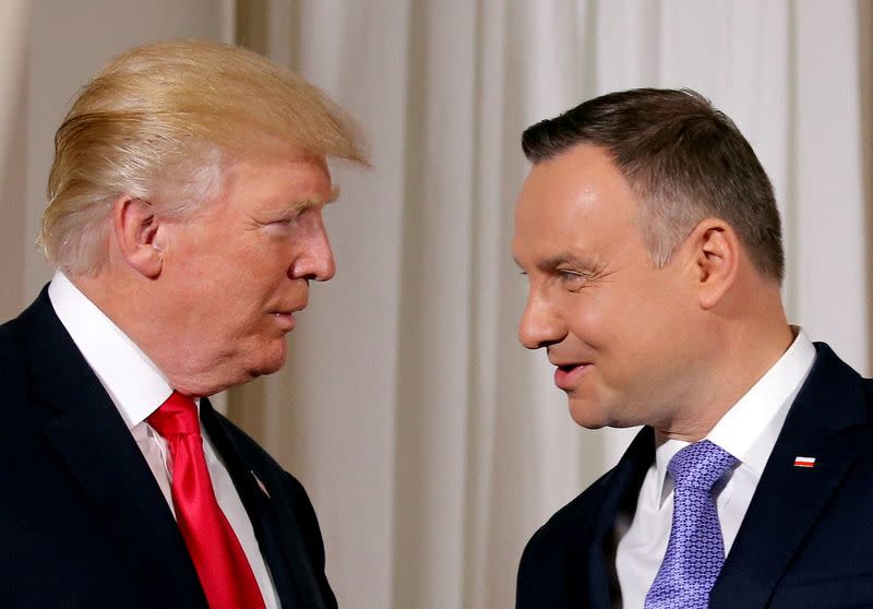 FILE PHOTO: U.S. President Donald Trump is greeted by Polish President Andrzej Duda in Warsaw