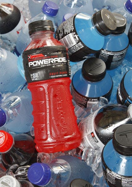 In this Aug. 5, 2010, file photo, bottles of Powerade sports drink and other Coca-Cola products are chilled over ice in Orlando, Fla. Jon Elswick | Associated Press