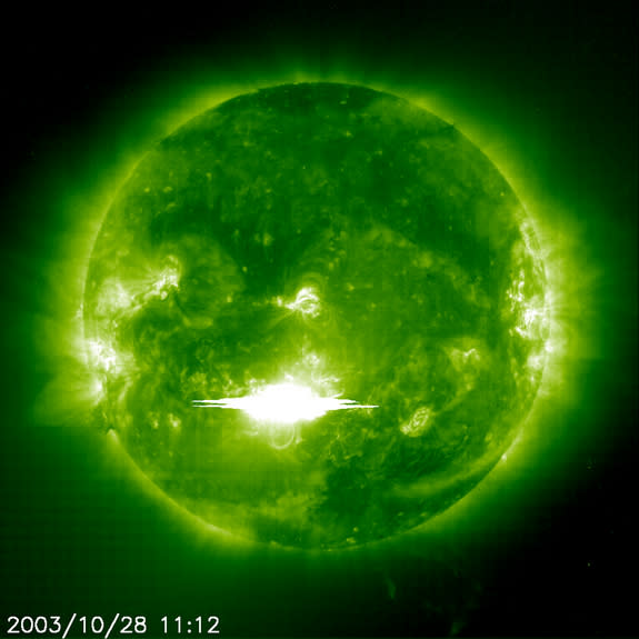 The Solar and Heliospheric Observatory (SOHO) spacecraft captured this image of a solar flare as it erupted from the sun early on Tuesday, October 28, 2003. The flare was recorded as a massive X45-class solar storm.