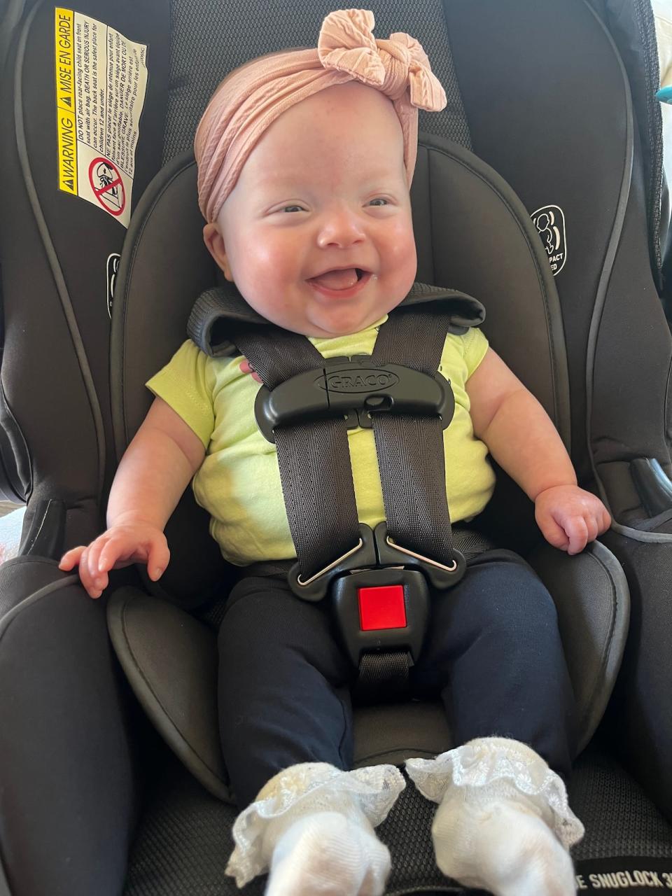 Sutton is all smiles while taking a car trip. 
