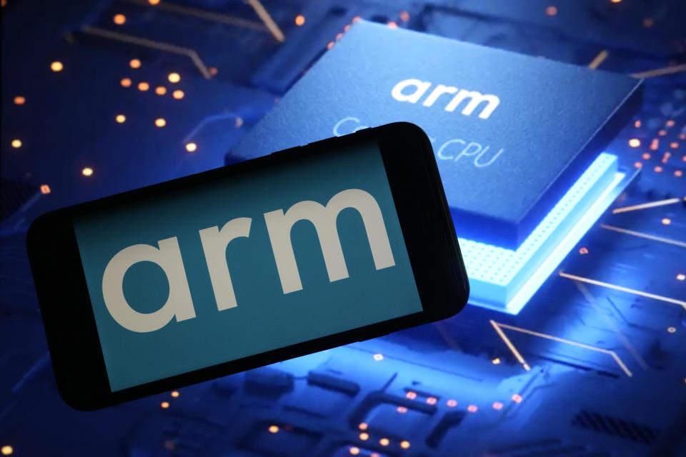 The logo for chip designer Arm and an Arm webpage are shown in this photo, in New York, Wednesday, Sept. 6, 2023. Shares in the company are expected to start trading on Thursday. (AP Photo/Richard Drew)