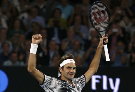 Tennis - Australian Open - Melbourne Park, Melbourne, Australia - 24/1/17 Switzerland's Roger Federer celebrates winning his Men's singles quarter-final match against Germany's Mischa Zverev. REUTERS/Thomas Peter