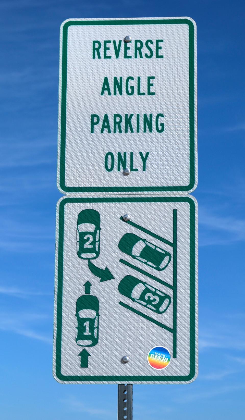 Confusion around reverse-angle parking in OKC's 39th Street District has turned into contention between local businesses and traffic commissioners.