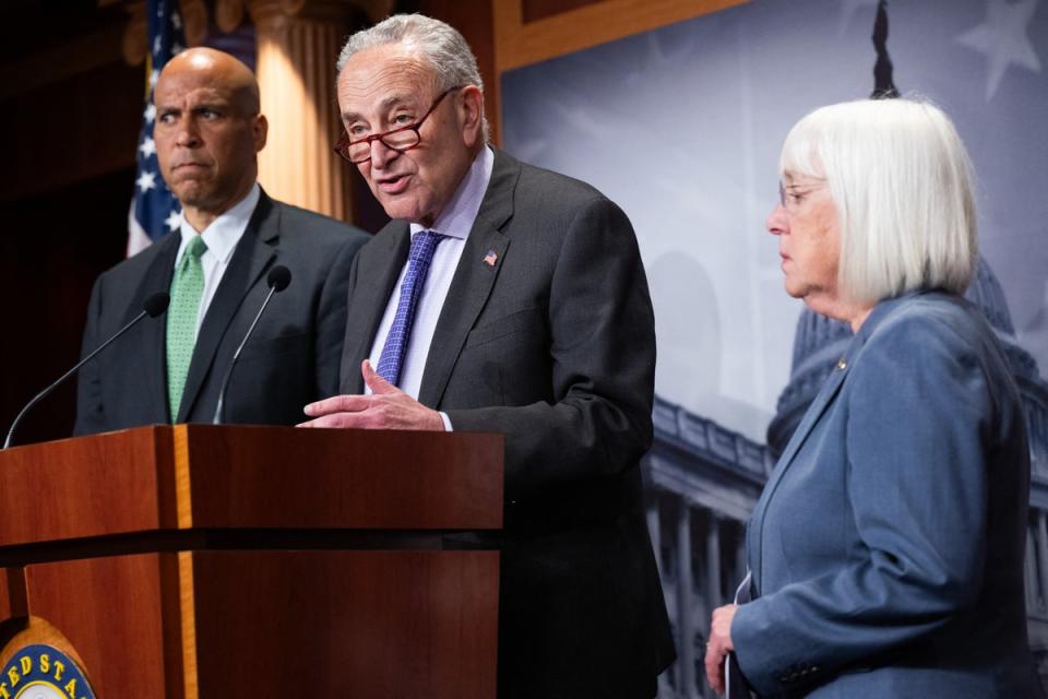 Cory Booker (left), Chuck Schumer (center) and Patty Murray (right) speak to reporters after Senate Republicans blocked IVF protections (AFP via Getty Images)