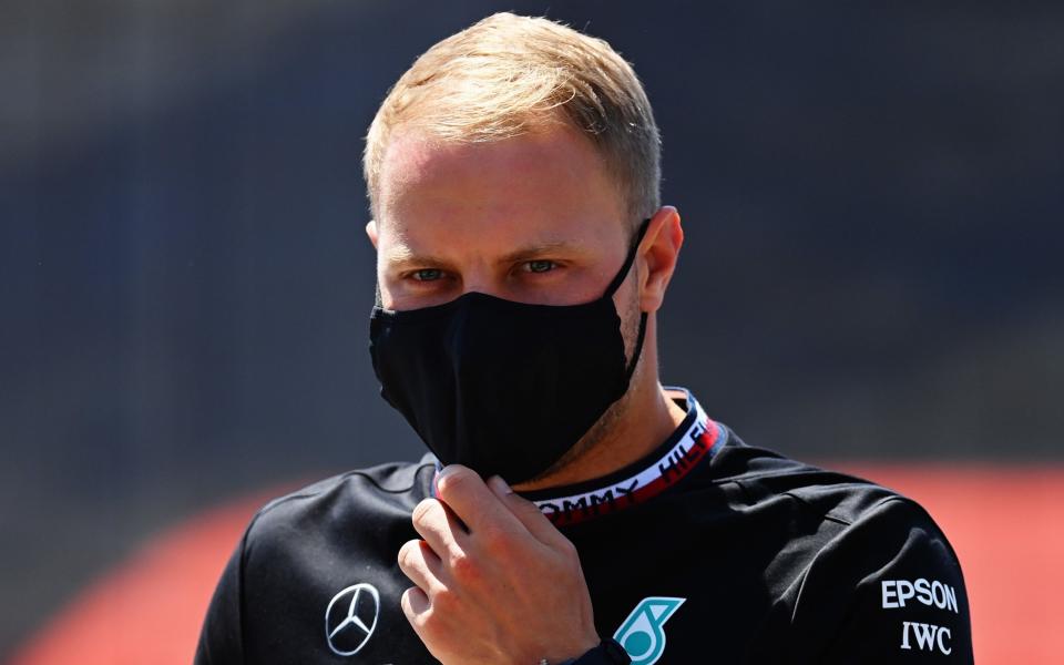 Valtteri Bottas of Finland and Mercedes GP talks to the media in the Paddock during previews ahead of the F1 Grand Prix of Spain at Circuit de Barcelona-Catalunya on May 06, 2021 in Barcelona, Spai - Formula 1/Formula 1 via Getty Images