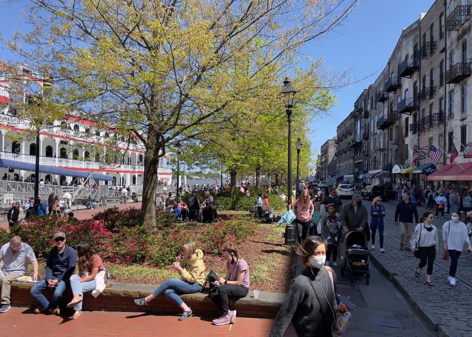 Tourists emjoy downtown Savannah, Georgia on March 3, 2021 during Spring break amid the Covid-19 pandemic. - Fully vaccinated people can start traveling again if they take precautions such as wearing a mask and observing social distancing, US health authorities said on April 2. Travel is picking up again in the US, especially due to spring break and Easter trips, after all but shutting down completely in the early months of the pandemic. (Photo by Daniel SLIM / AFP) (Photo by DANIEL SLIM/AFP via Getty Images)