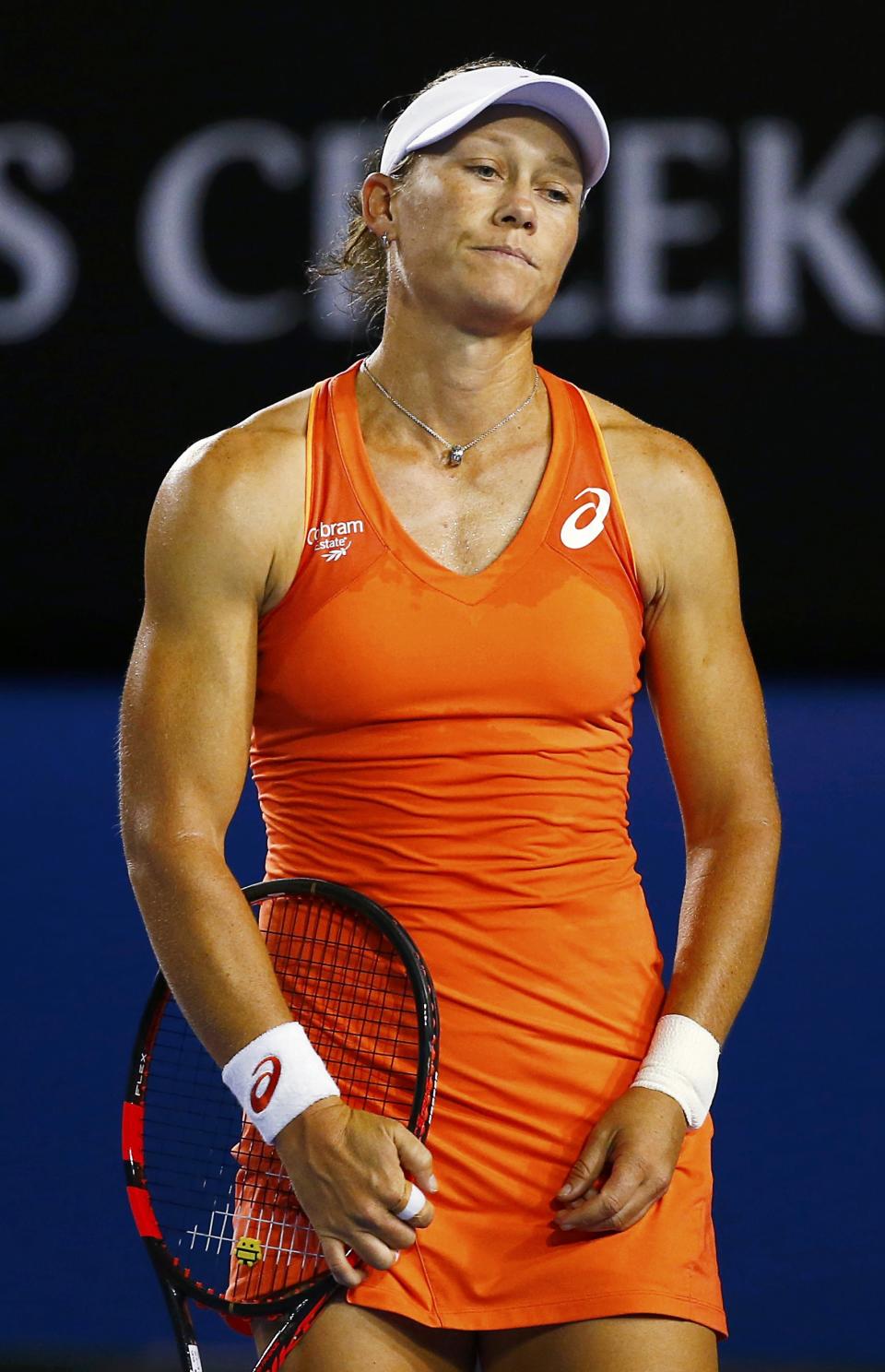 Samantha Stosur of Australia reacts after losing a point to Coco Vandeweghe of the U.S. during their women's singles second round match at the Australian Open 2015 tennis tournament in Melbourne