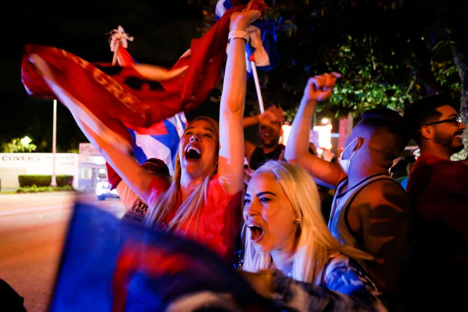 Supporters of President Donald Trump rally in front of Cuban restaurant Versailles in Miami, Florida on November 3, 2020.