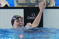 Erika Fairweather of New Zealand celebrates after winning the women's 400-meter freestyle final at the World Aquatics Championships in Doha, Qatar, Sunday, Feb. 11, 2024. (AP Photo/Hassan Ammar)