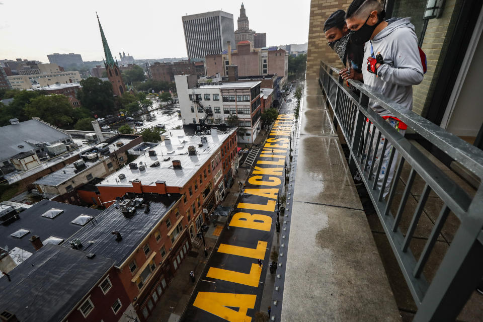 FILE - In this June 27, 2020, file photo, a mural that reads "ALL BLACK LIVES MATTER" is painted on Halsey Street in Newark, N.J. Thousands of Black activists from across the U.S. will hold the 2020 Black National Convention on Aug. 28, 2020, via livestream to produce a new political agenda that builds on the protests that followed George Floyd’s death. Organizers of the gathering shared their plans with The Associated Press on Wednesday, July 1, ahead of an official announcement. (AP Photo/John Minchillo, File)