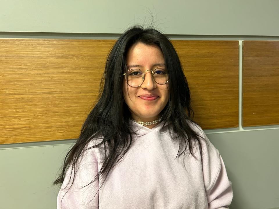 Domenici Medina, an international student from Ecuador, says students should not be put in a situation where they constantly have to worry about money. 