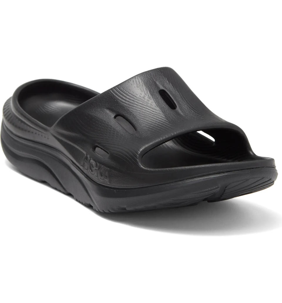 If you've been searching for a comfortable, cushiony slide to wear post-workout or by the pool, I promise you, the HOKA Ora Recovery Slides are 