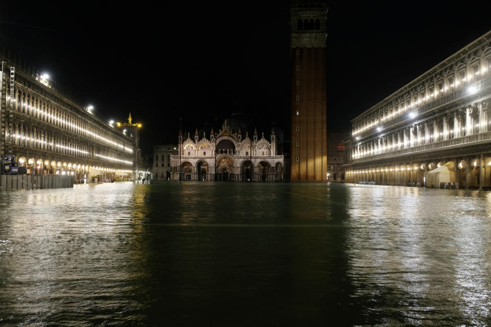 A flooded St.Mark's Square is pictured during a period of seasonal high water in Venice, Italy November 12, 2019. REUTERS/Manuel Silvestri