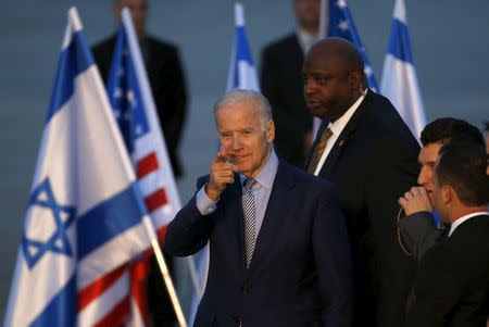 U.S. Vice President Joe Biden (C) gestures after disembarking from a plane upon landing at Ben Gurion International Airport in Lod, near Tel Aviv, Israel March 8, 2016. REUTERS/Baz Ratner TPX IMAGES OF THE DAY