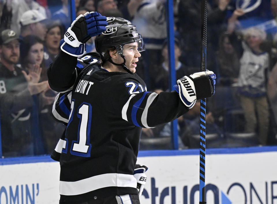 Tampa Bay Lightning center Brayden Point (21) celebrates his goal during the second period of an NHL hockey game against the Montreal Canadiens, Saturday, March 2, 2024, in Tampa, Fla. (AP Photo/Jason Behnken)