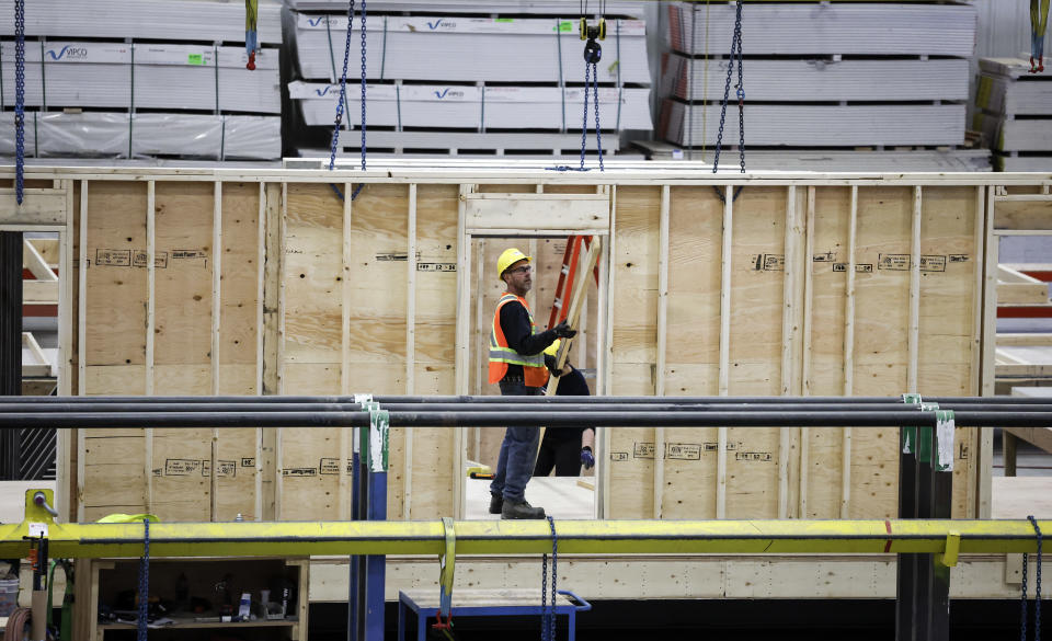 An employee works on a modular home component at NRB Modular Solutions in Calgary, Friday, April 5, 2024.THE CANADIAN PRESS/Jeff McIntosh