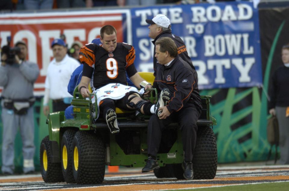 Cincinnati Bengals quarterback Carson Palmer is taken off the fields after injuring his knee during the first quarter against the Pittsburgh Steelers in their AFC Wildcard playoff game at Paul Brown Stadium in Cincinnati, January 8, 2006. The Steelers won 31-17. (Photo by John Sommers/Icon SMI/Icon Sport Media via Getty Images)