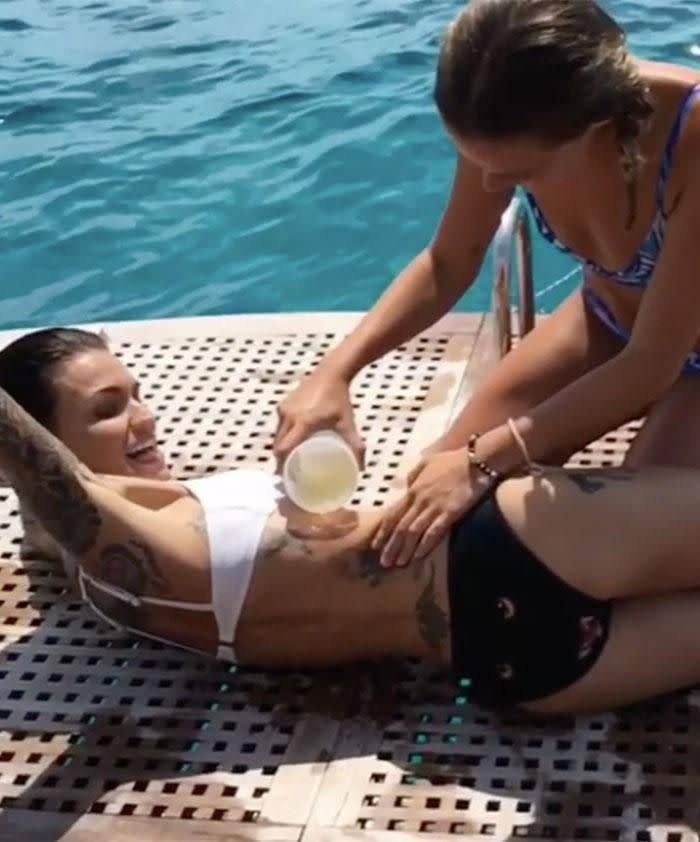 Ruby getting liquid that looks like pee poured on her. Source: Instagram.