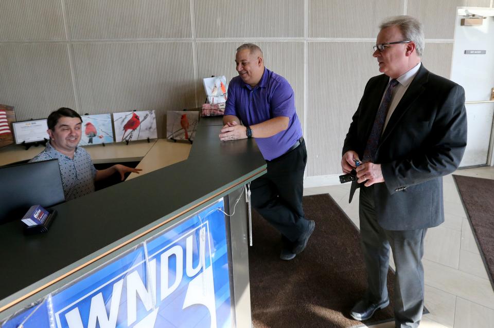 WNDU-TV television journalist Terry McFadden, right, speaks with “Big Al” McNeer, left, and News Director Mike Pease Tuesday, Feb. 27, 2024, at the WNDU-TV station in South Bend.